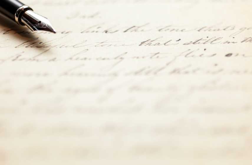 Ink bottles and handwriting shown on the CIA's official Secret Writing explainer page